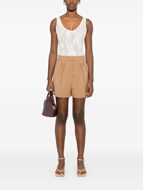 Body de encaje con escote redondo