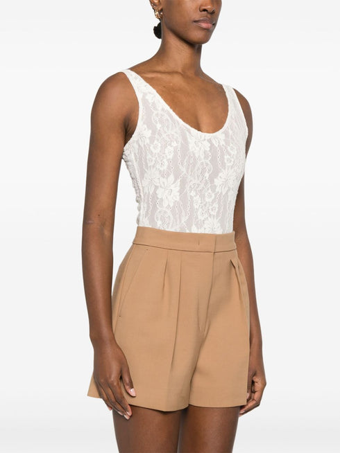 Body de encaje con escote redondo