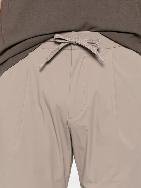 drawstring-waist trousers