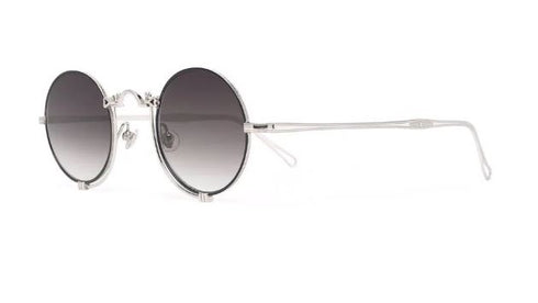 Солнцезащитные очки в круглой оправе