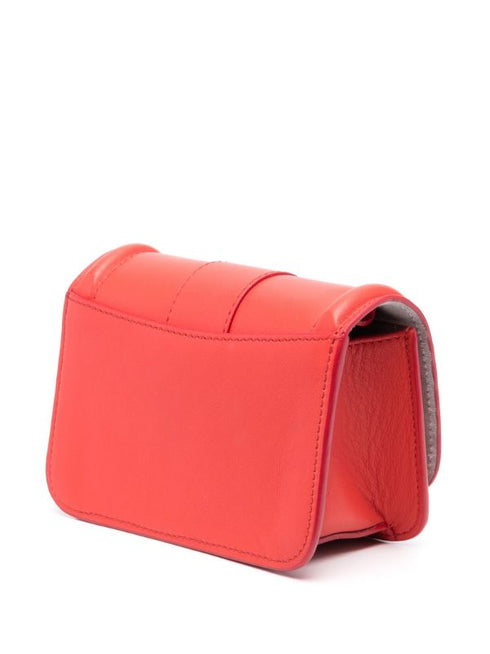 bolso mini con placa del logo