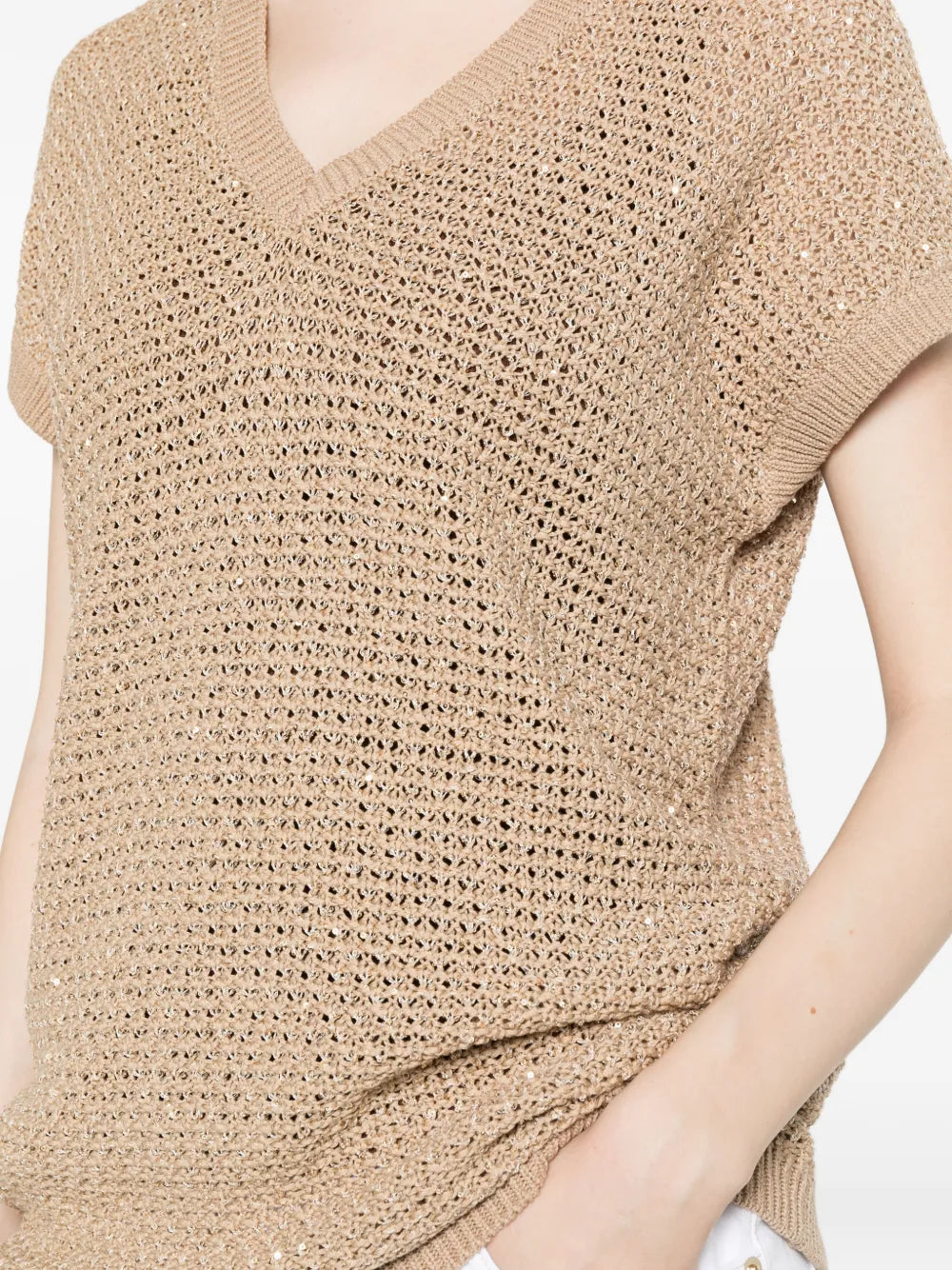 chaleco con cuello en V y lentejuelas
