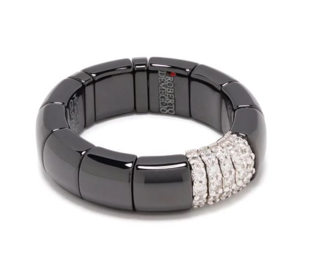anillo en oro blanco de 18kt con diamantes y cerámica negra 